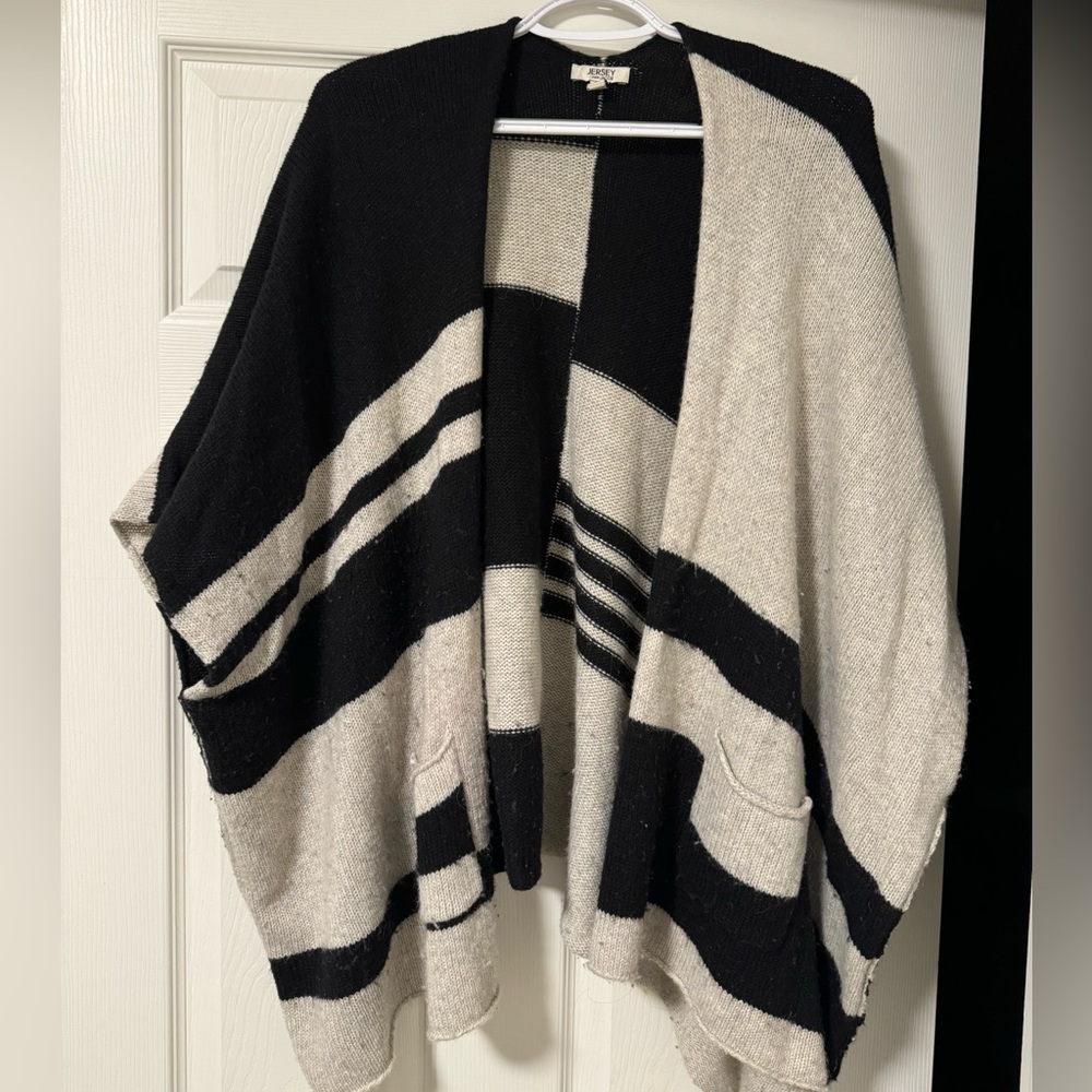 Sleeveless cosy throw
